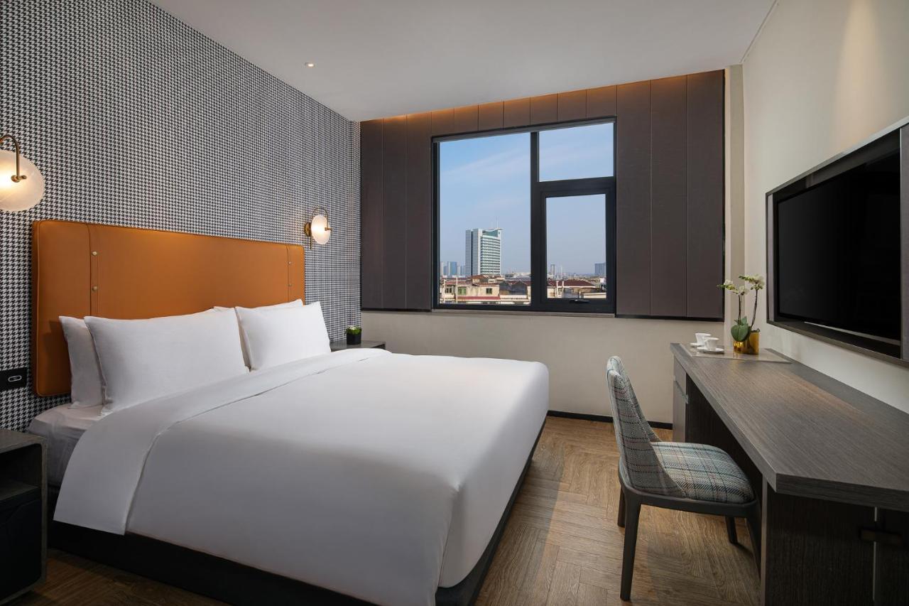 Kasion Pugis Hotel Yiwu  Exteriör bild