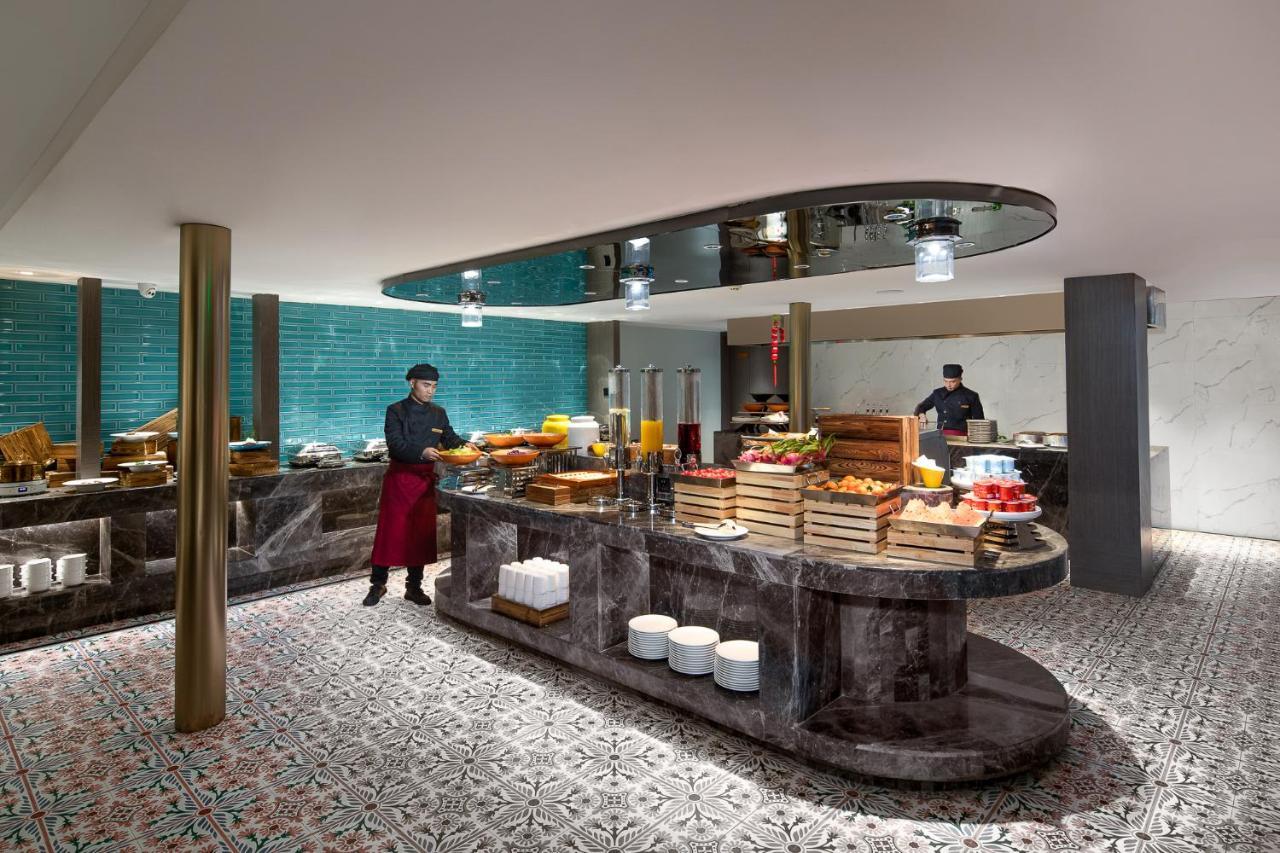 Kasion Pugis Hotel Yiwu  Exteriör bild