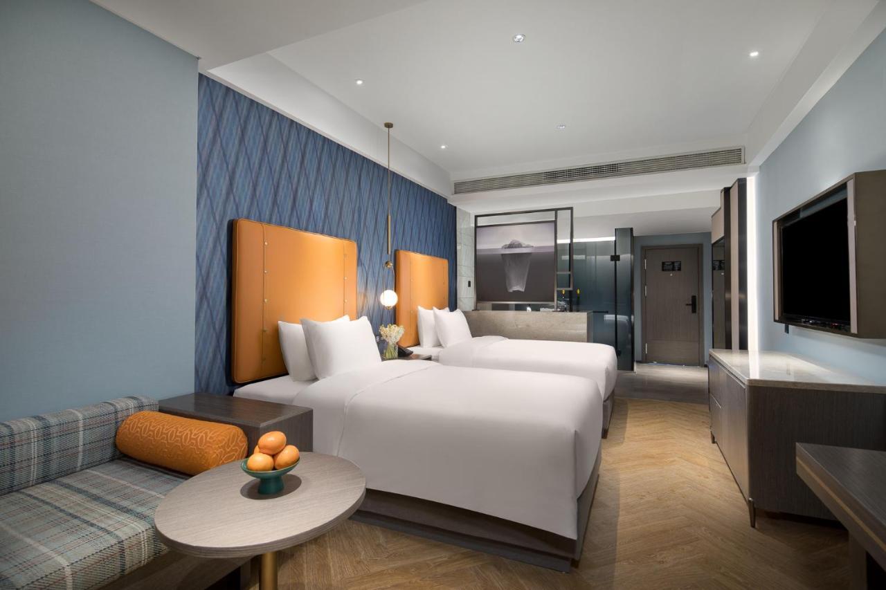 Kasion Pugis Hotel Yiwu  Exteriör bild