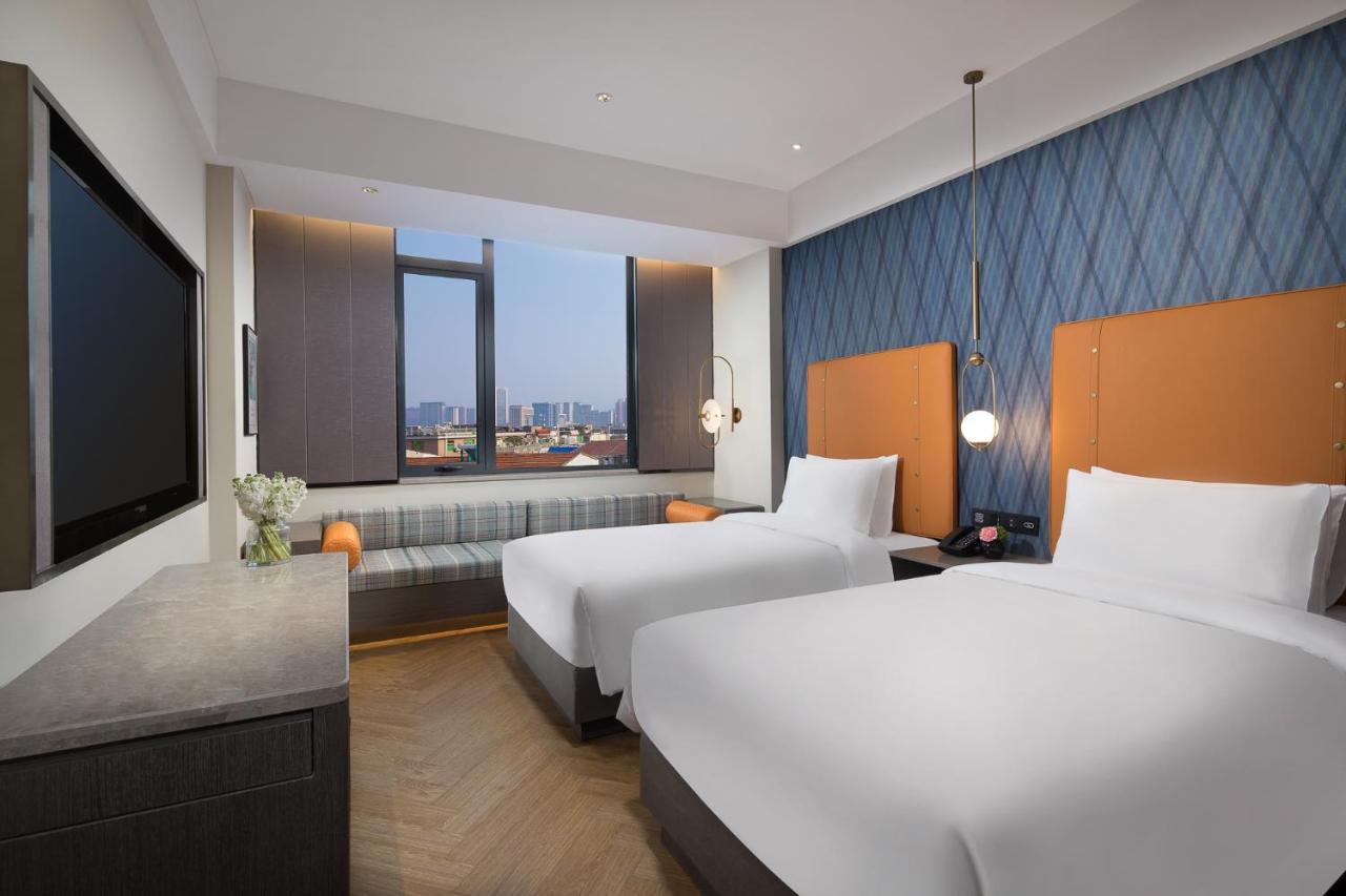 Kasion Pugis Hotel Yiwu  Exteriör bild